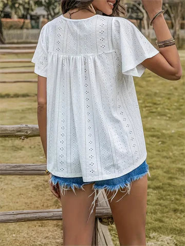 Zelda - Eyelet top met strikhals